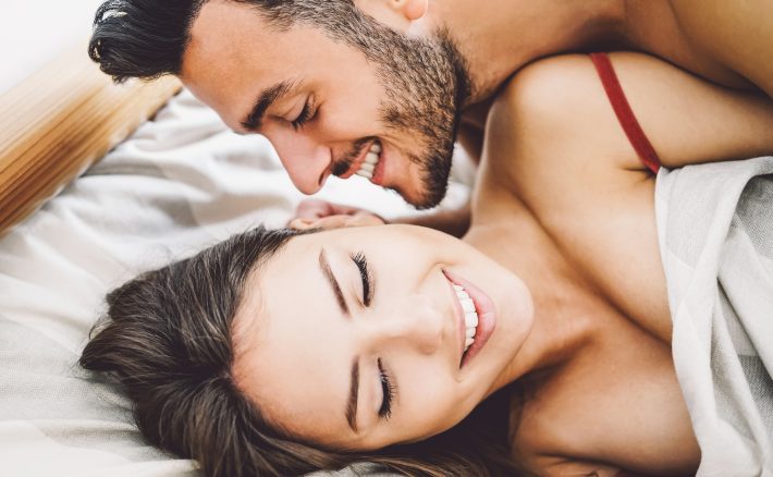 Happy romantic couple having sex